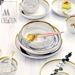 Whether you're hosting a dinner party or simply enjoying a meal with your family, the Marble Mosaic Ceramic Purity Dinnerware Set is sure to impress. Upgrade your dining experience with this complete set, including sauce bowl, ceramic glass, soup bowl, and dish plate. Order yours today and make every meal a celebration of beauty and purity.