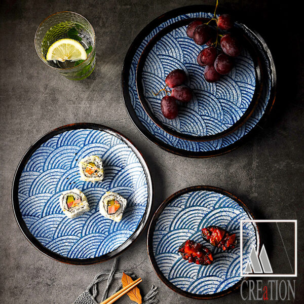 Bring the beauty of the sea to your dining table with our Sea Swirls Tunisian Ceramic Dream Plates. Made with care in the M'Creations workshop in Kairouan, this complete dinnerware set is the epitome of luxurious, high-quality craftsmanship. The iconic sea wave patterns are hand-painted with attention to detail, showcasing the traditional Tunisian hand work. With a mix of matte and shiny grey edges, each piece in this set exudes sophistication and elegance.